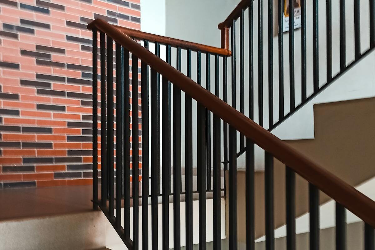 Modern staircase with metal railing
