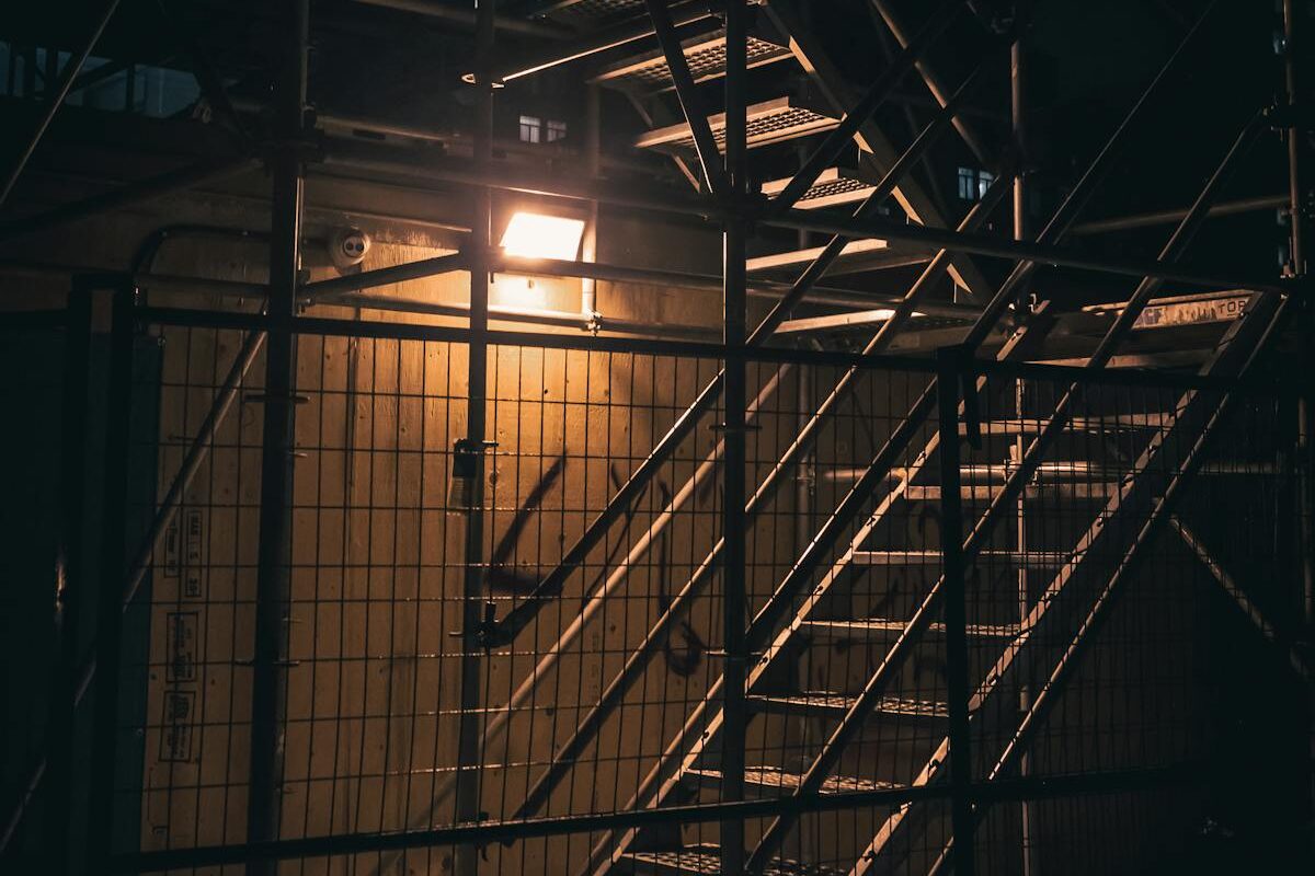 Steel staircase structure with handrails